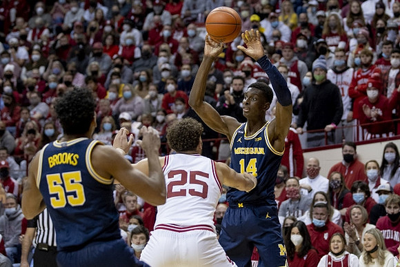 Eli Brooks (55) and Moussa Diabate (14)