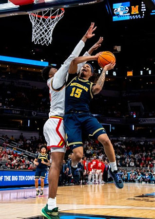 Rubin Jones (15) and Tre Donaldson (3)