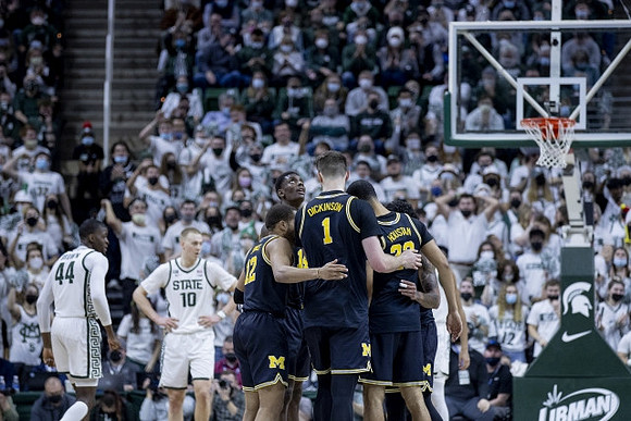 DeVante' Jones (12), Moussa Diabate (14), Hunter Dickinson (1), and Caleb Houstan (22)
