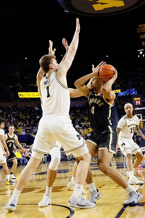 Tre Donaldson (3), Danny Wolf (1), and Rubin Jones (15)