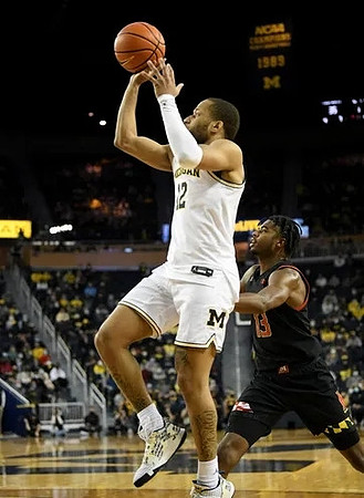 DeVante' Jones (12)