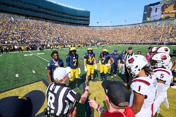 Rod Moore (9), Makari Paige (7), Max Bredeson (44), and Donovan Edwards (7)