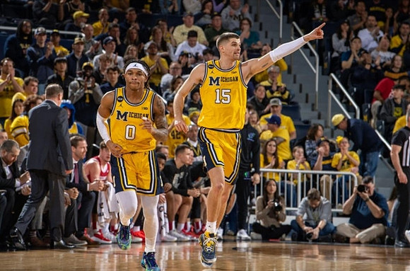 Dug McDaniel (0) and Joey Baker (15)