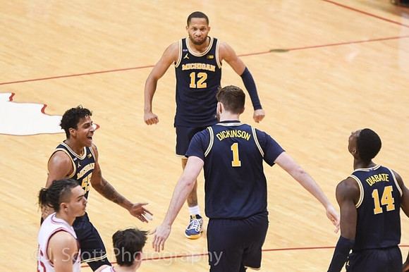 Eli Brooks (55), Hunter Dickinson (1), DeVante' Jones (12), and Moussa Diabate (14)