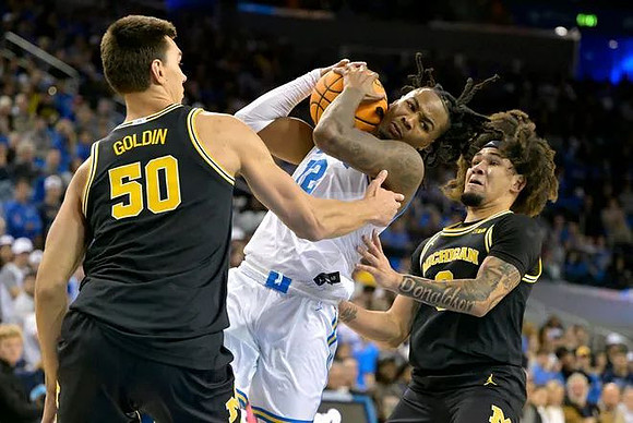 Vladislav Goldin (50) and Tre Donaldson (3)