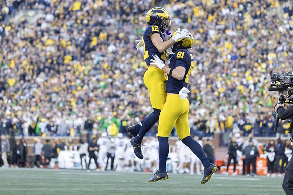 Kendrick Bell (12) and Peyton O'Leary (81)