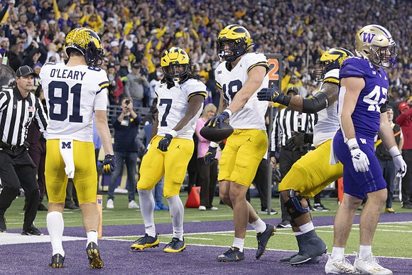 Peyton O'Leary (81), Donovan Edwards (7), and Colston Loveland (18)