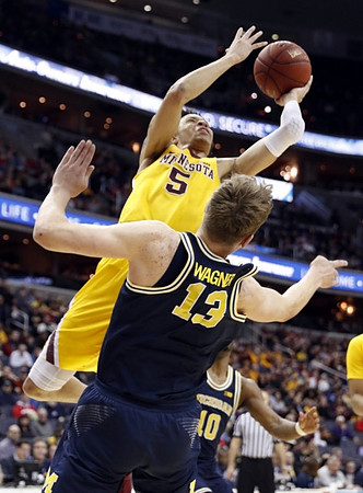 Moritz Wagner (13) and Derrick Walton Jr. (10)