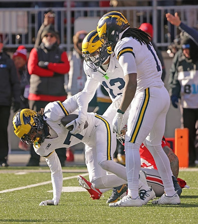 Donovan Edwards (7), Wesley Walker (13), and Jaishawn Barham (1)