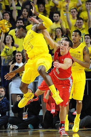 Glenn Robinson III (1) and Trey Burke (3)