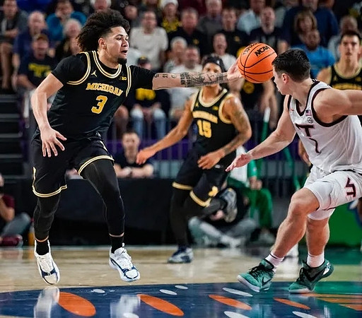 Tre Donaldson (3) and Rubin Jones (15)