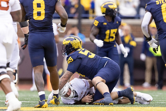 Derrick Moore (8), Mason Graham (55), Ernest Hausmann (15), and Josaiah Stewart (0)