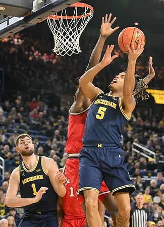 Hunter Dickinson (1) and Terrance Williams II (5)