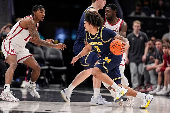 Danny Wolf (1) and Tre Donaldson (3)