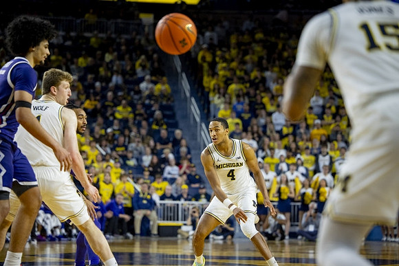 Danny Wolf (1), Nimari Burnett (4), and Rubin Jones (15)