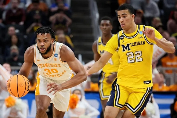 Caleb Houstan (22) and Moussa Diabate (14)