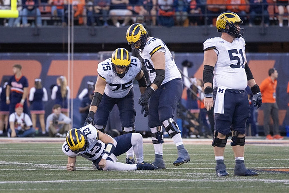 Jack Tuttle (13), Andrew Gentry (75), Jeffrey Persi (79), and Greg Crippen (51)