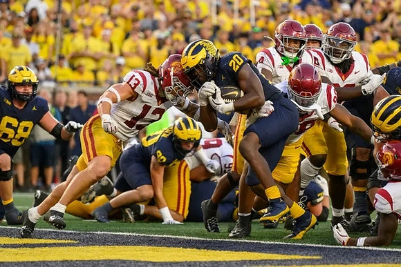 Josh Priebe (68), Hogan Hansen (80), and Kalel Mullings (20)