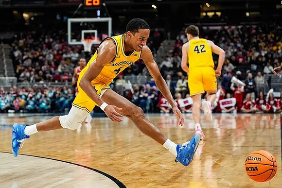 Nimari Burnett (4) and Will Tschetter (42)