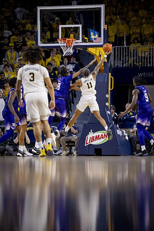 Tre Donaldson (3) and Roddy Gayle Jr. (11)