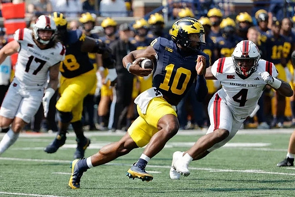 Myles Hinton (78) and Alex Orji (10)