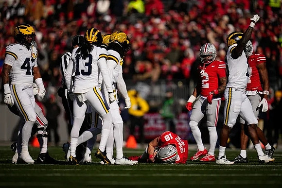 TJ Guy (42), Wesley Walker (13), and Makari Paige (7)