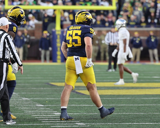 Derrick Moore (8) and Mason Graham (55)