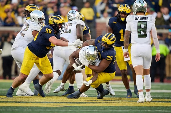 Mason Graham (55), Rayshaun Benny (26), Quinten Johnson (28), and Jaishawn Barham (1)