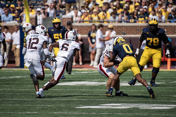 Semaj Morgan (0), Myles Hinton (78), and Greg Crippen (51)