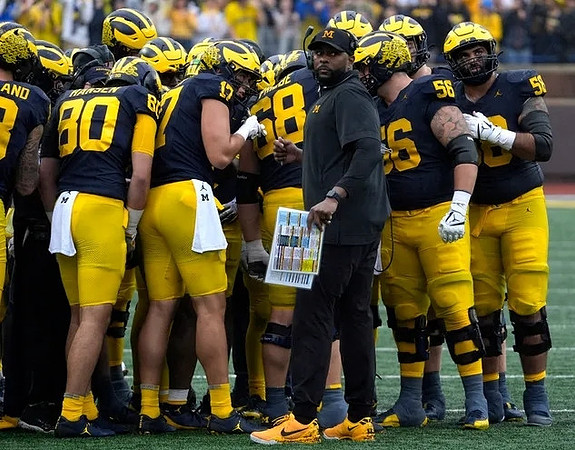 Sherrone Moore and Michigan Team