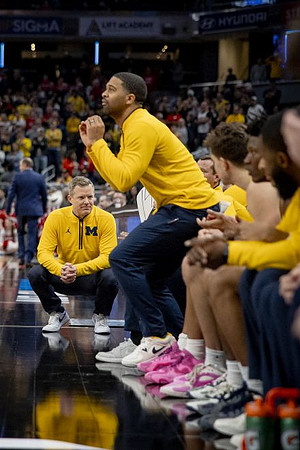 Dusty May and Michigan Team