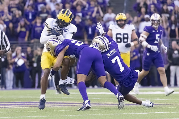 Josh Priebe (68) and Amorion Walker (1)