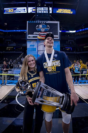 Vladislav Goldin (50) and Big Ten Tournament Championship Trophy