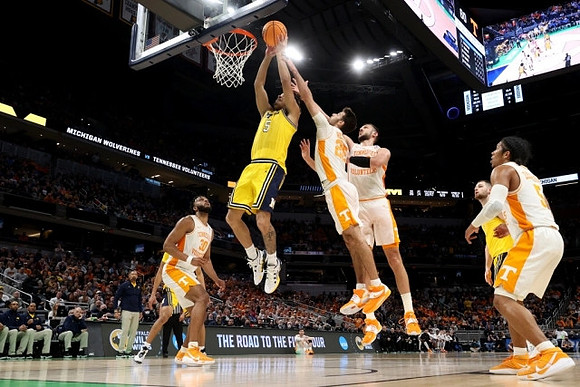 Terrance Williams II (5) and Hunter Dickinson (1)