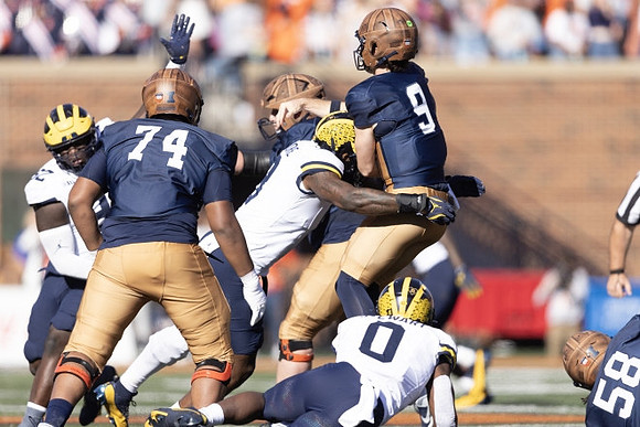 Ike Iwunnah (92), Josaiah Stewart (0), and Derrick Moore (8)