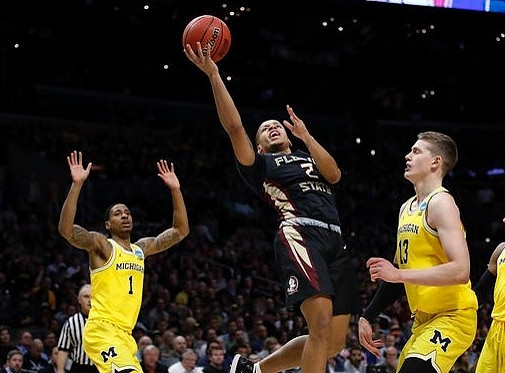 Charles Matthews (1) and Moritz Wagner (13)