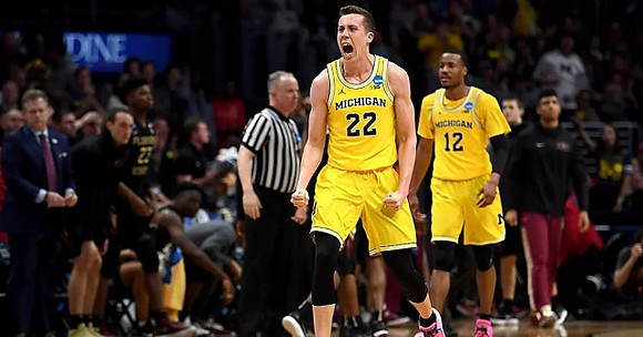 Duncan Robinson (22) and Muhammad-Ali Abdur-Rahkman (12)