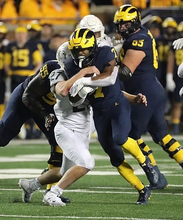 Olusegun Oluwatimi (55), Donovan Edwards (7), and Zak Zinter (65)