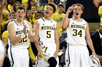 Ricky Doyle (32), D.J. Wilson (5), and Mark Donnal (34)