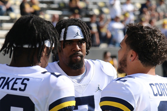 CJ Stokes (23), Donovan Edwards (7), and Blake Corum (2)