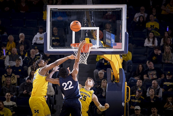 Tarris Reed Jr. (32) and Joey Baker (15)