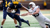 Roman Wilson (14) and Blake Corum (2)