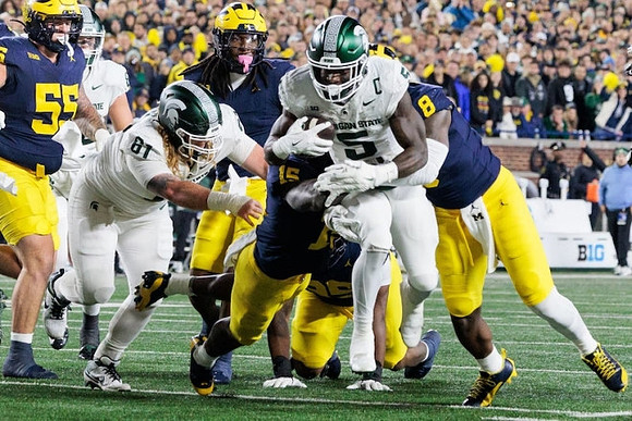 Mason Graham (55), Ernest Hausmann (15), and Derrick Moore (8)