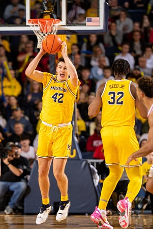 Will Tschetter (42) and Tarris Reed Jr. (32)