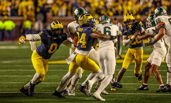 Josaiah Stewart (0), Jaydon Hood (34), and Jyaire Hill (20)