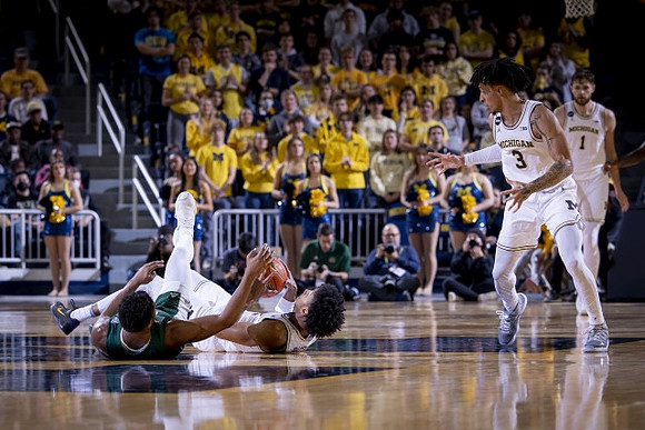 Kobe Bufkin (2), Jaelin Llewellyn (3), and Isaiah Barnes (11)