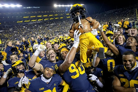 Michigan Team and Paul Bunyan Trophy