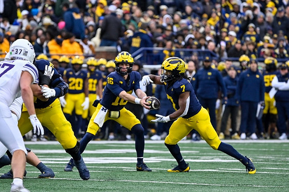 Davis Warren (16), Donovan Edwards (7), and Evan Link (71)