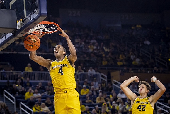 Nimari Burnett (4) and Will Tschetter (42)