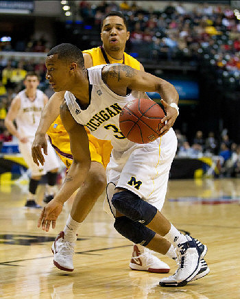 Stu Douglass (1) and Trey Burke (3)